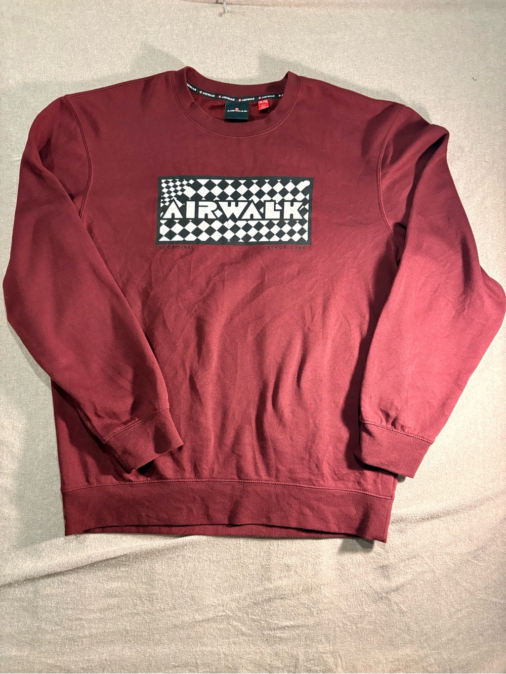 Airwalk Men's Maroon Crewneck Sweatshirt with Checkerboard Logo.